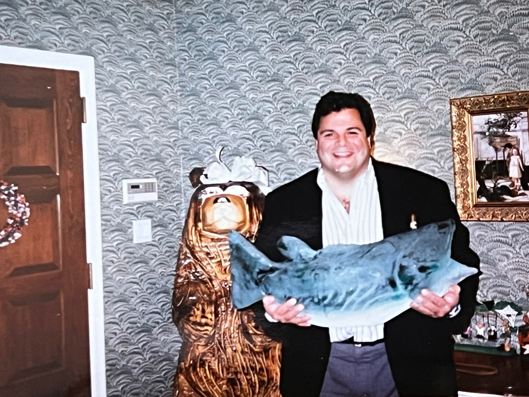 Richard all dressed up and still holding a fish — formal night, but still completely himself