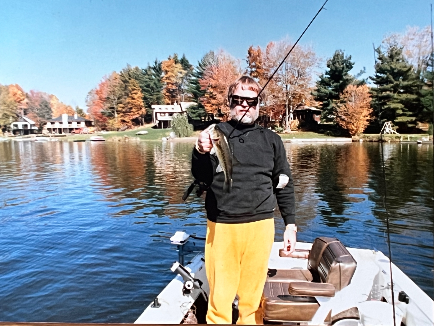 Autumn bass on The Hideout lake — colors blazing, another one landed