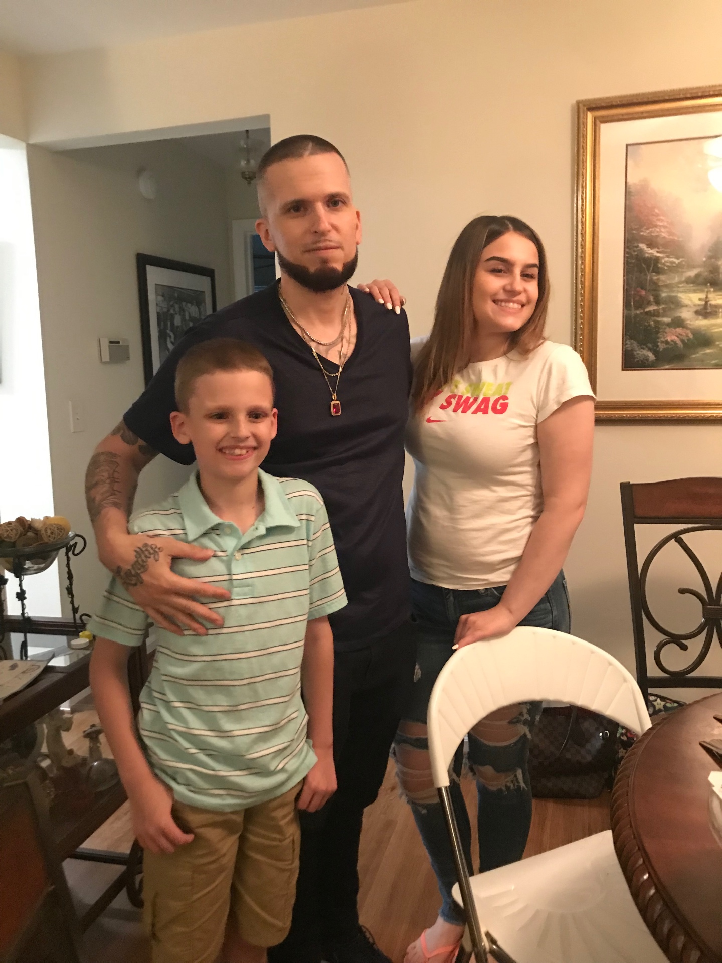 Jason with Malayna and Sean — the next chapter of the Bladis family, all together