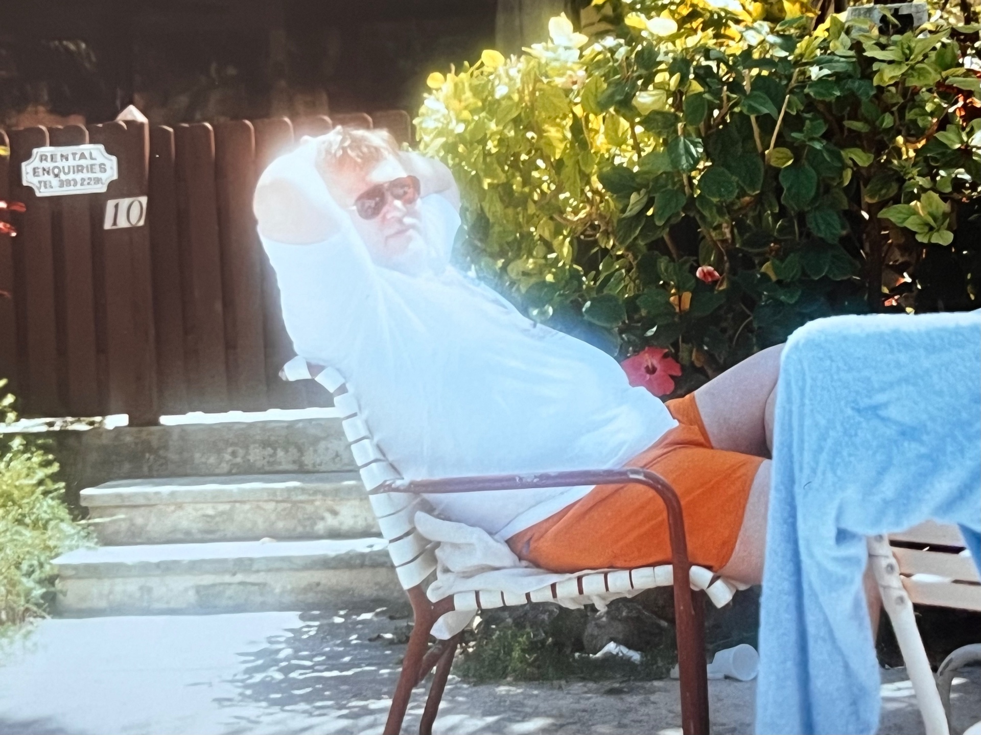 Sun on his face, not a care in the world — Richard doing vacation the right way