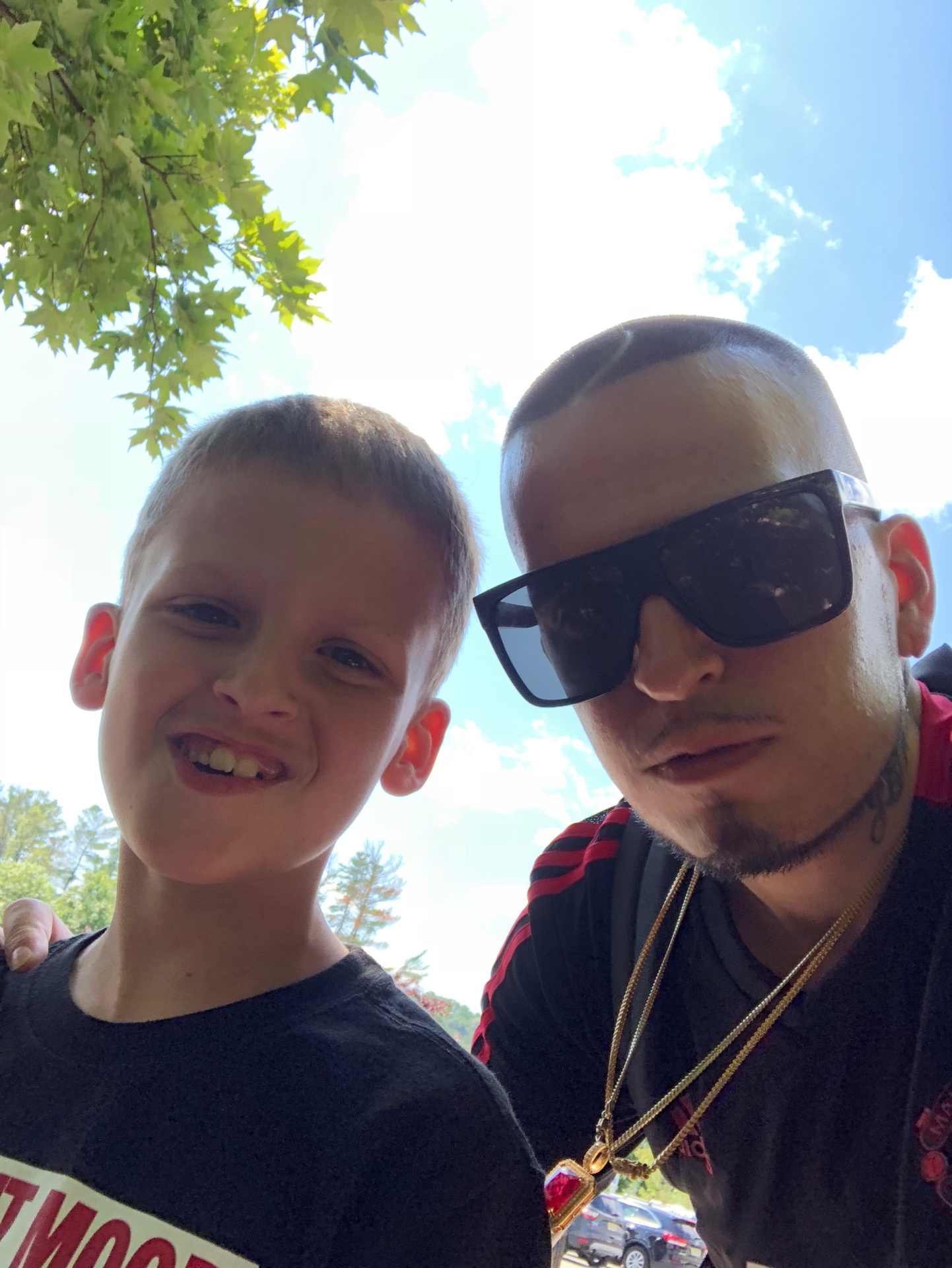 Sunny day selfie — Sean and Dad, side by side, no place they'd rather be