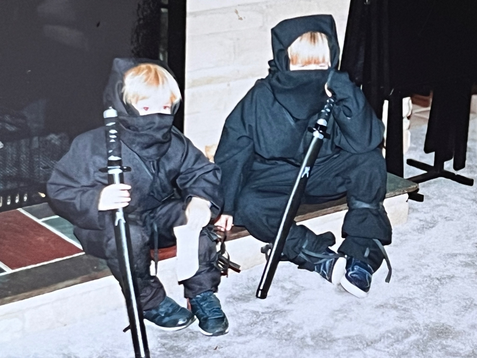 Two little ninjas ready for anything — Halloween at its finest