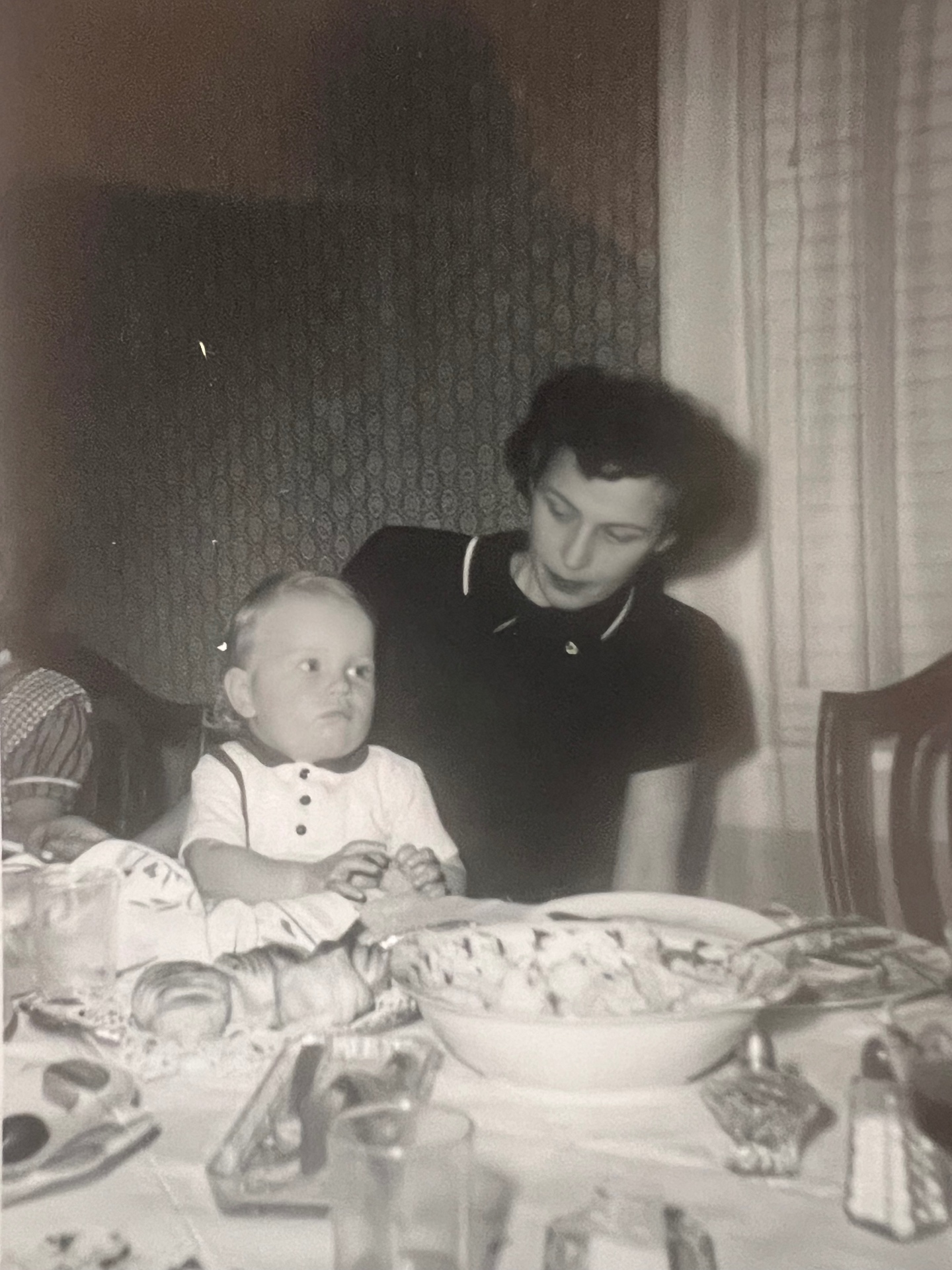 At the table with Mom — the world small, safe, and full of love