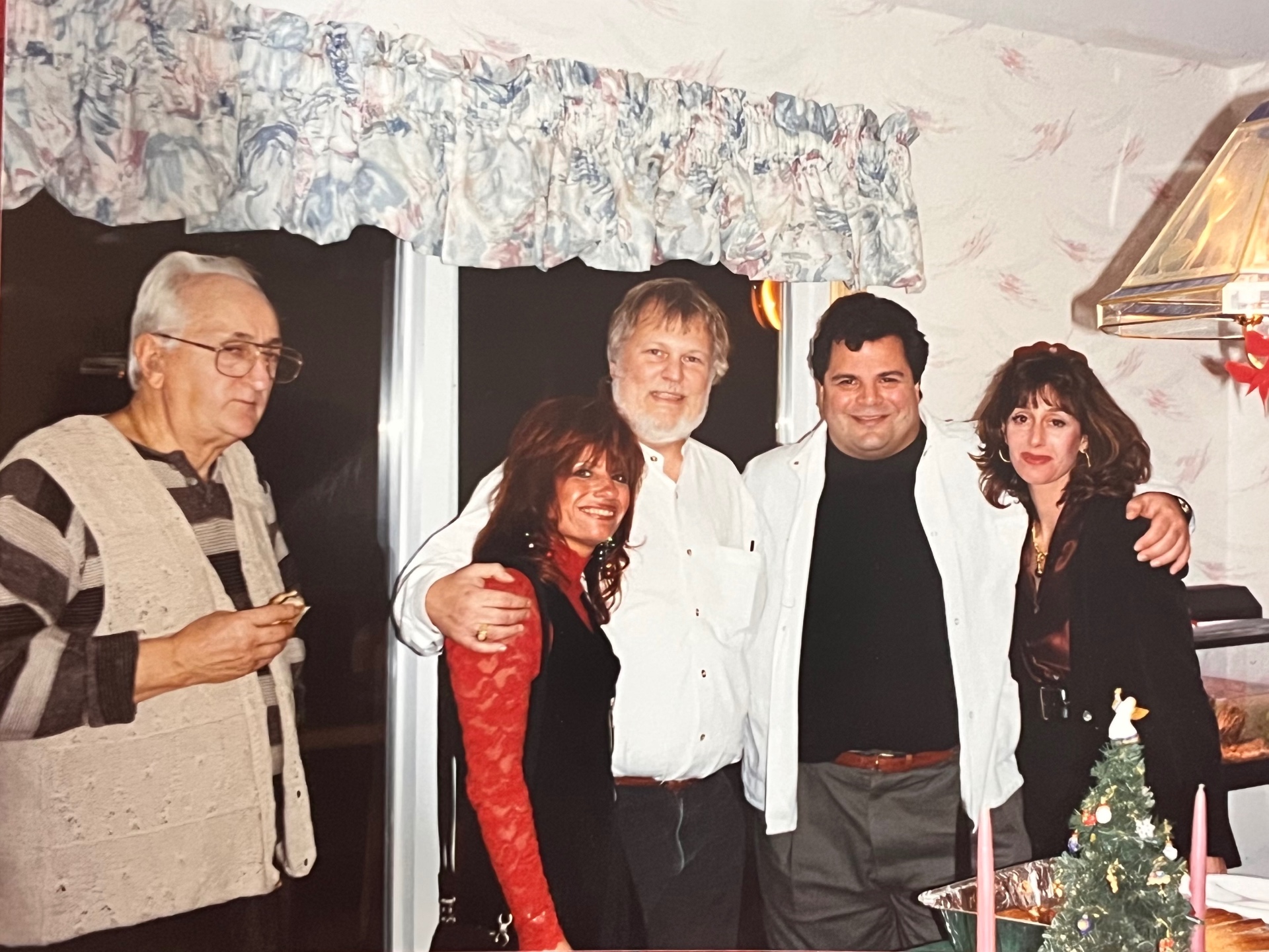 Christmas at the Bladis house — family gathered around, laughter filling the room