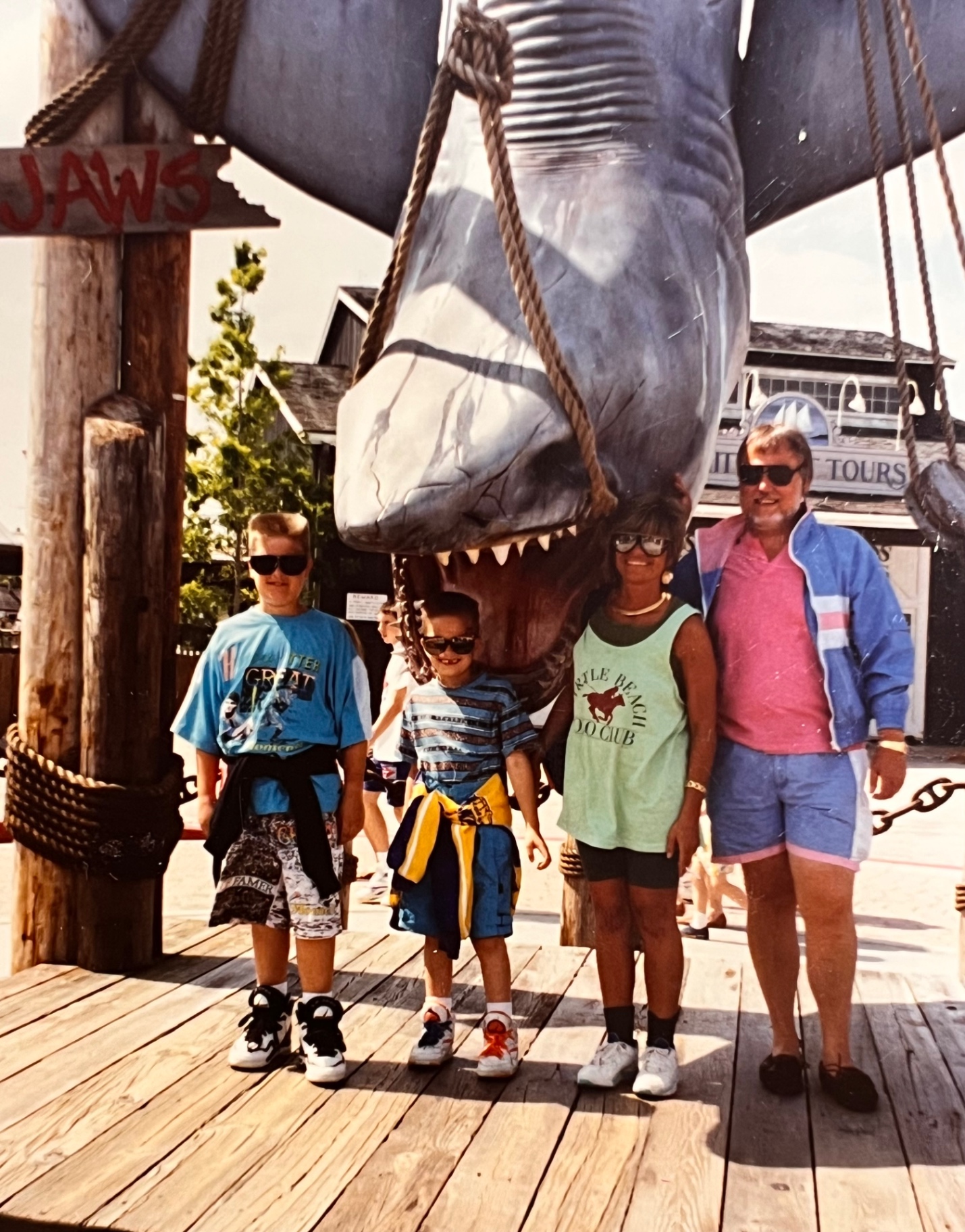 Under the JAWS shark with Yvonne and the boys — one of those unforgettable family vacation stops