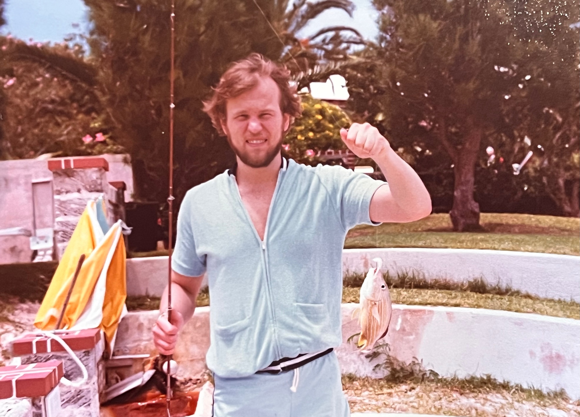 Bermuda dockside — small catch, big grin. Richard could turn any pier into a memory