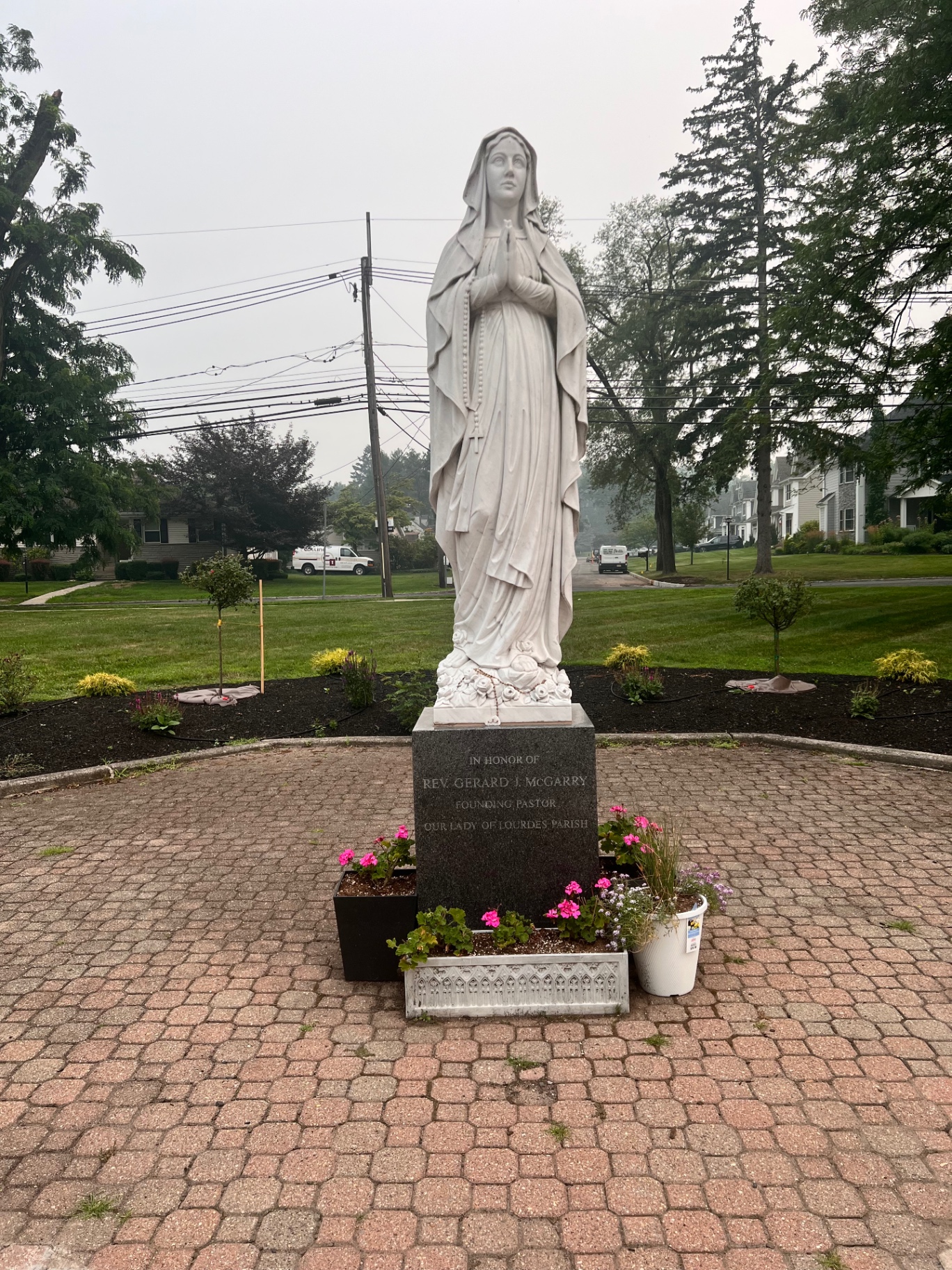 Marble statue of Our Lady of Lourdes donated by the Bladis family in honor of Rev. Gerard J. McGarry