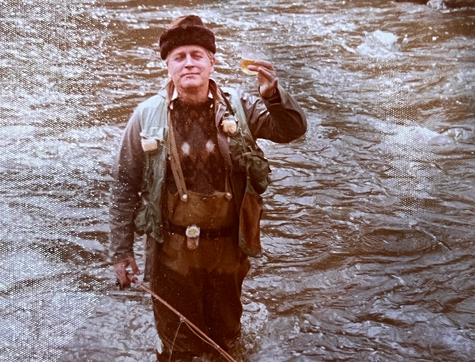 Streamside in his waders — Richard in his element, fly rod ready. The 1970s trout runs he lived for