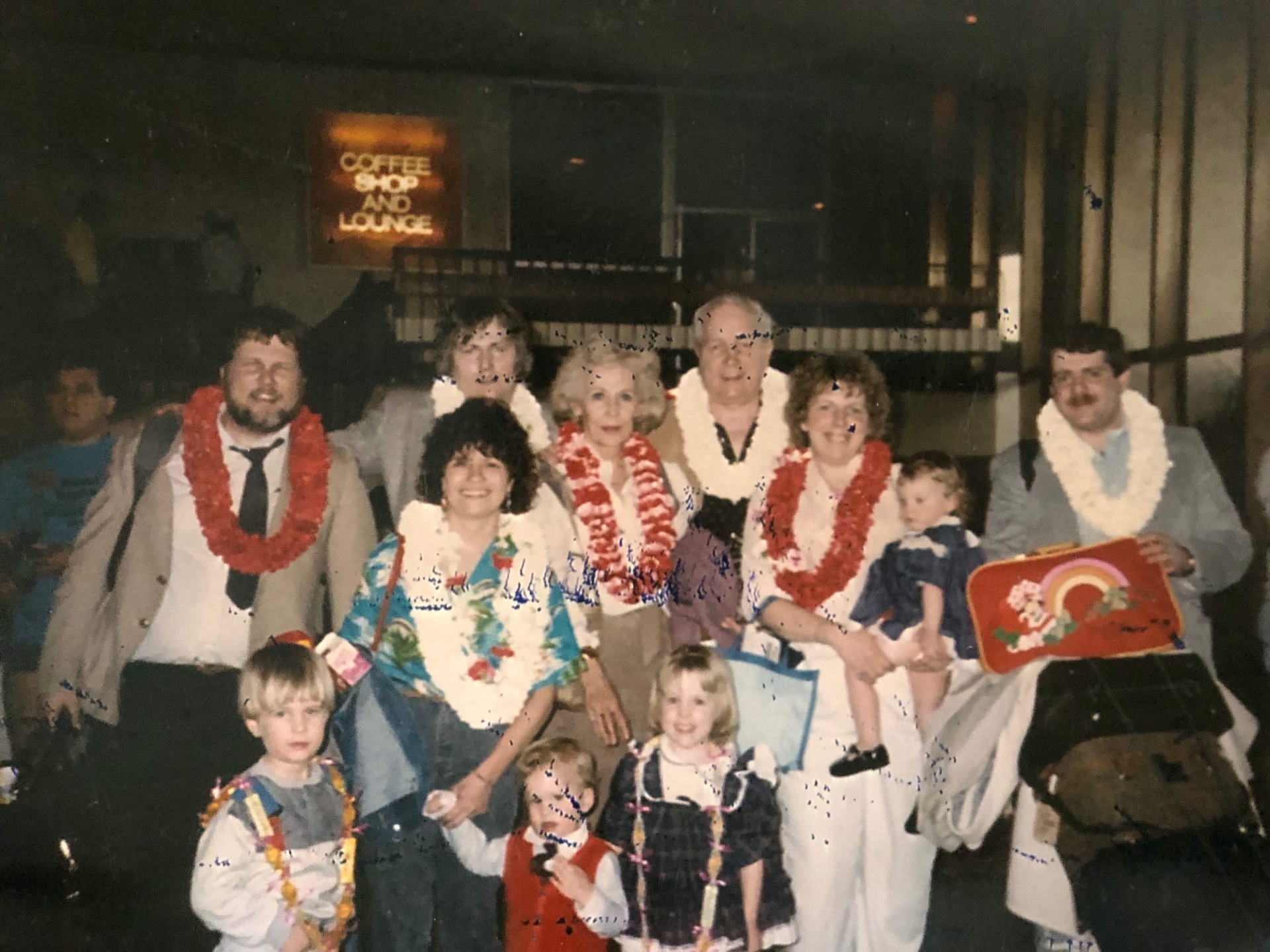 Aloha! The whole Bladis family arriving in Hawaii — leis, smiles, and a lifetime of memories