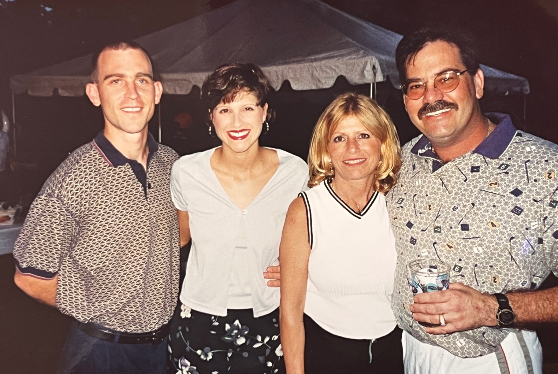 Cousins & friends dressed to celebrate — the yearly reunion under the tent