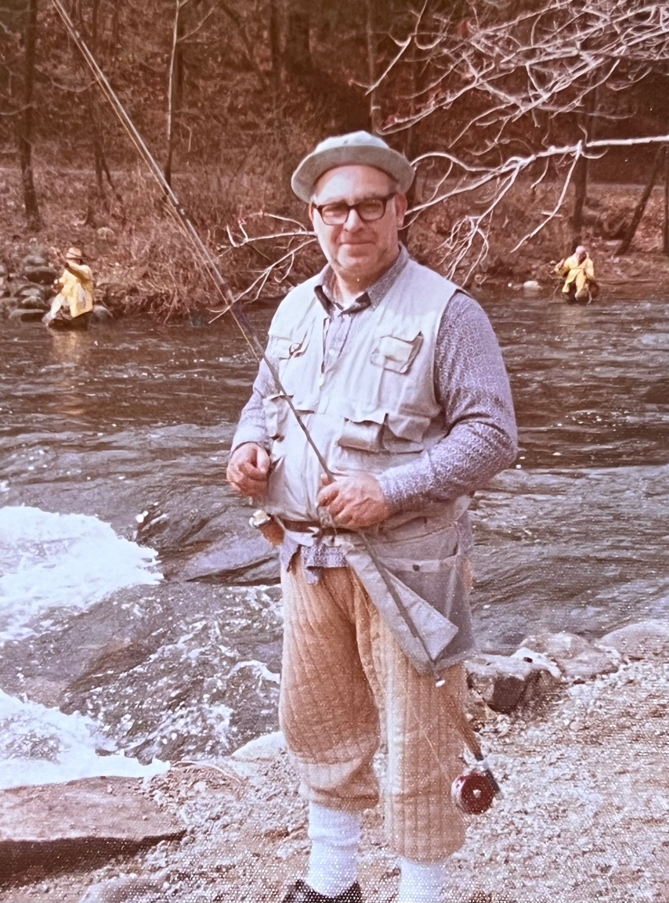 Opening day of trout season — Richard's dad on the water, the tradition passed straight down. Where it all started for him