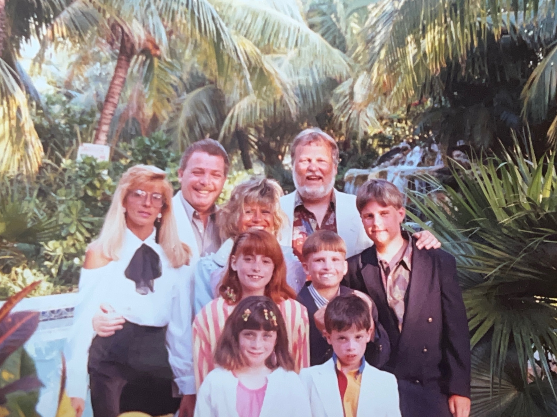 The whole crew under the palms — one of those trips that felt like the whole world got it right