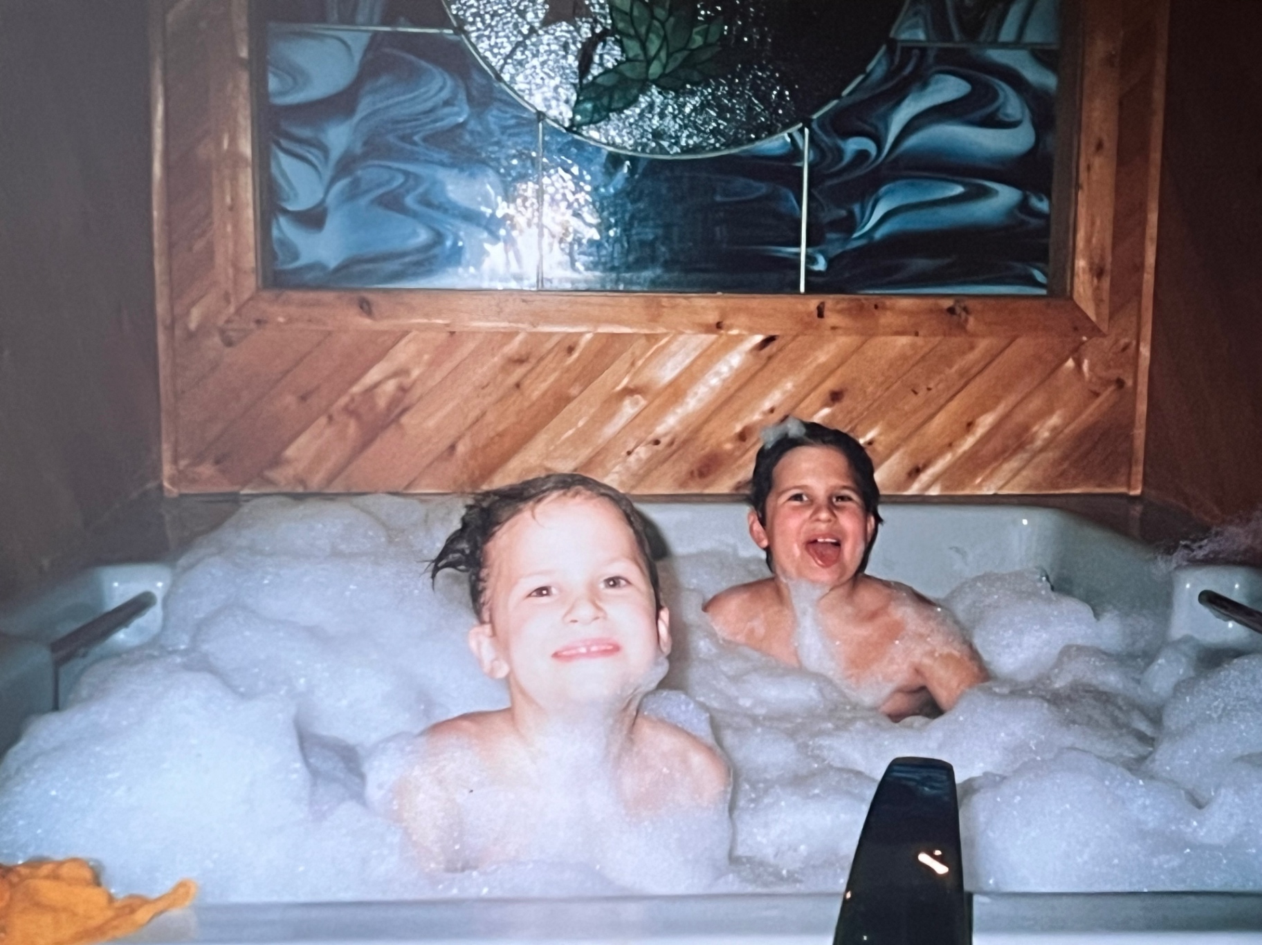 Bubble bath chaos and laughter — the kind of childhood memory a family tells forever