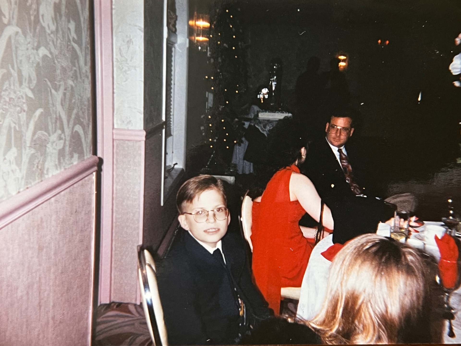 One of the boys dressed up for a night out — glasses on, ready for the evening