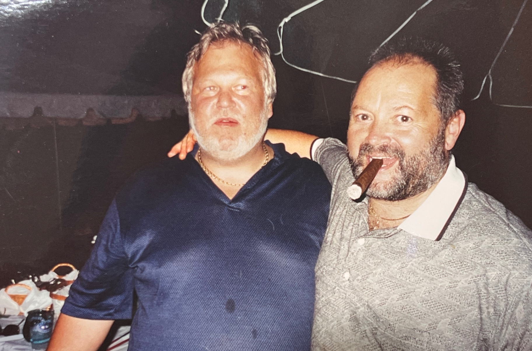 Richard and Uncle Frankie “Popeye” under the tent — arm-in-arm, cigar-in-mouth