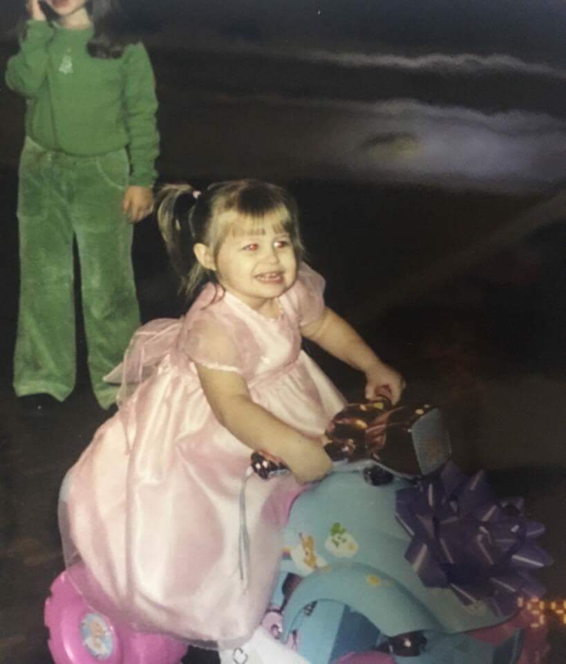 Princess Malayna in her pink dress — riding pretty and living her best day
