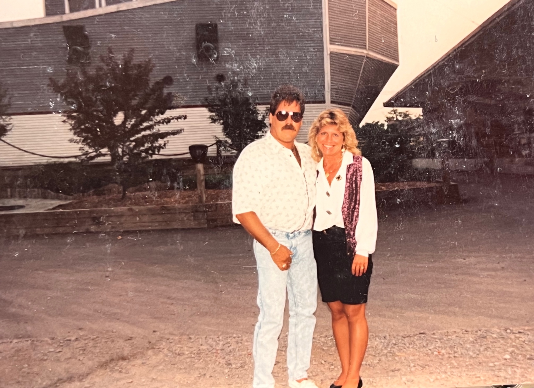 Richard and Yvonne on a summer getaway — aviators, denim, and that classic Bladis smile