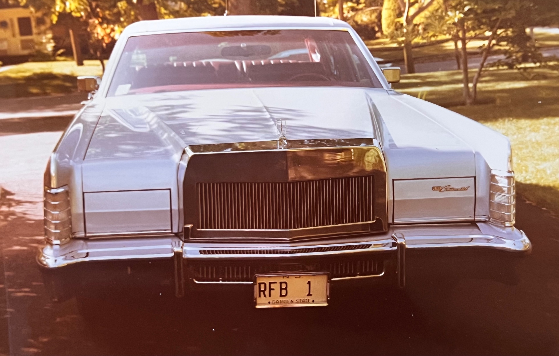 The Cadillac he bought — Garden State plate 'RFB 1', Richard F. Bladis. His pride, parked in front of the house he built