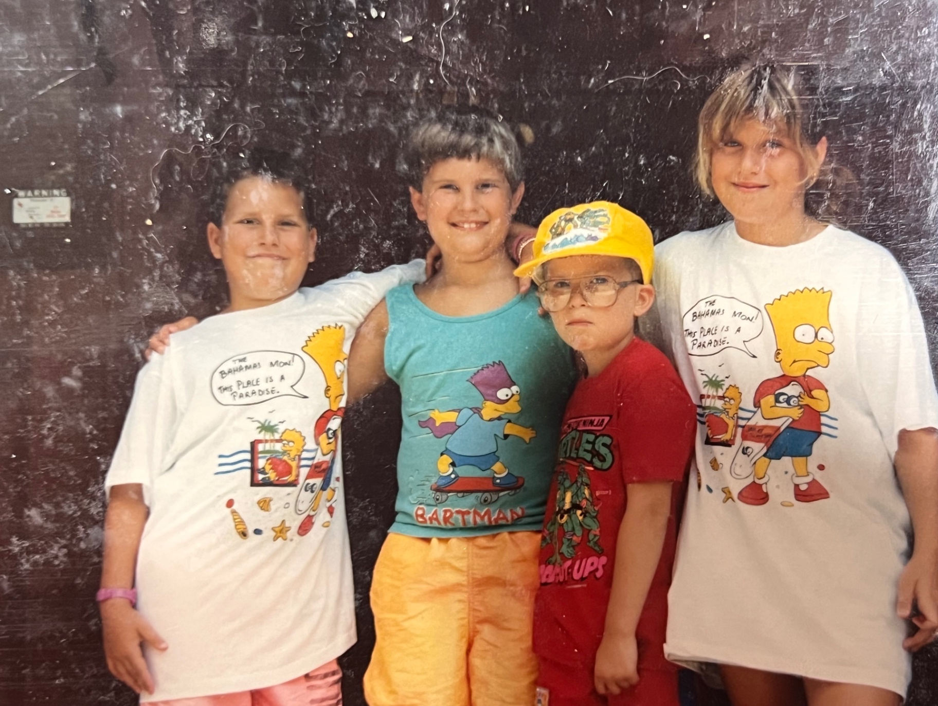 The Bahamas, mon — the boys and their cousins soaked through in matching Bart shirts. Only Dad could pull off a trip like this