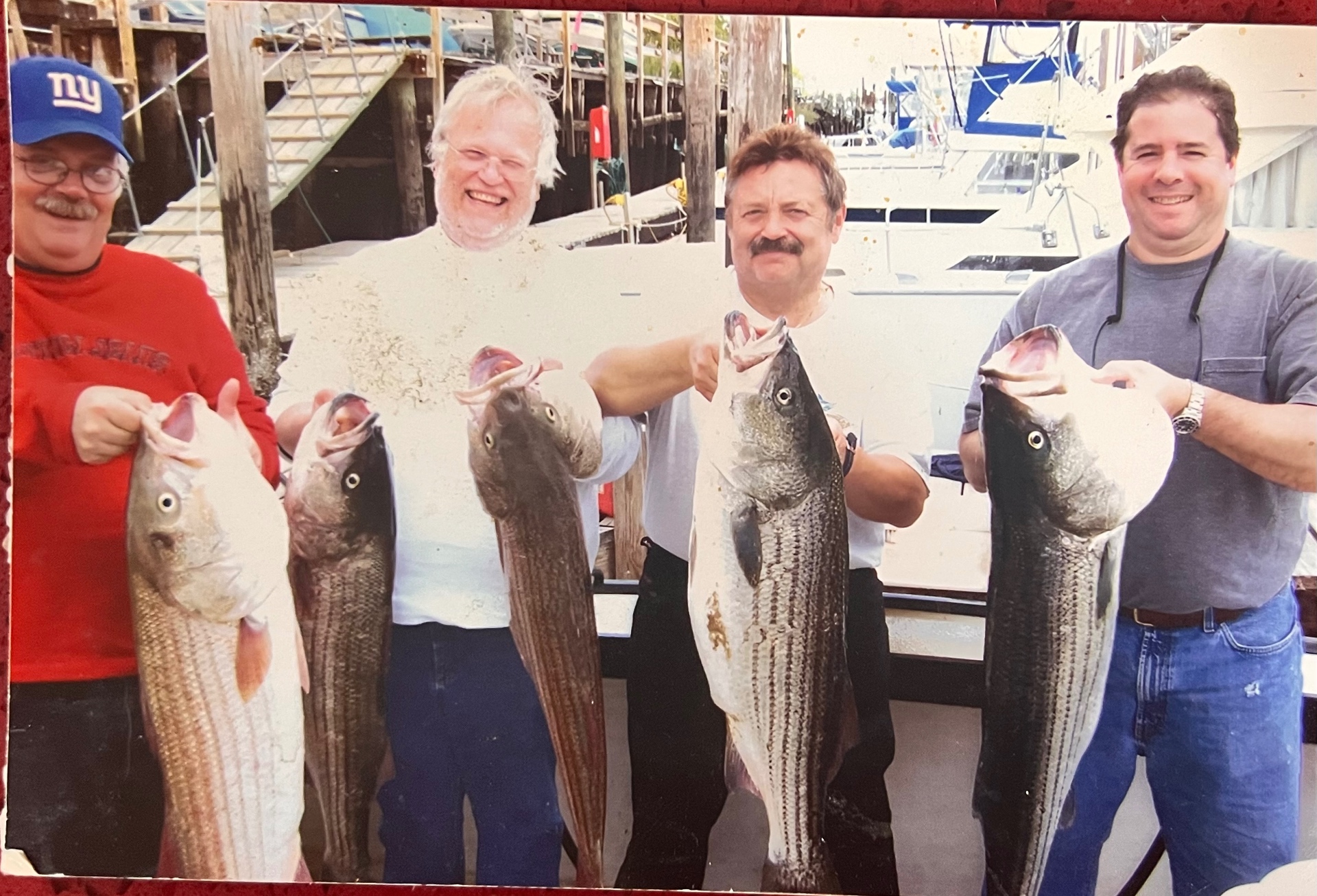 The catch of the day — striped bass with the guys