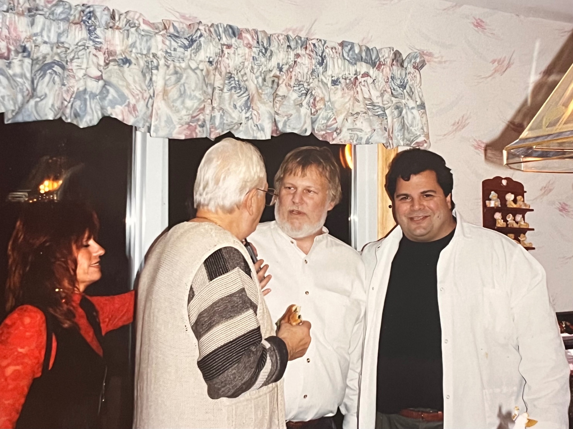 Holiday gathering — Richard sharing stories with family, the way every good night should end