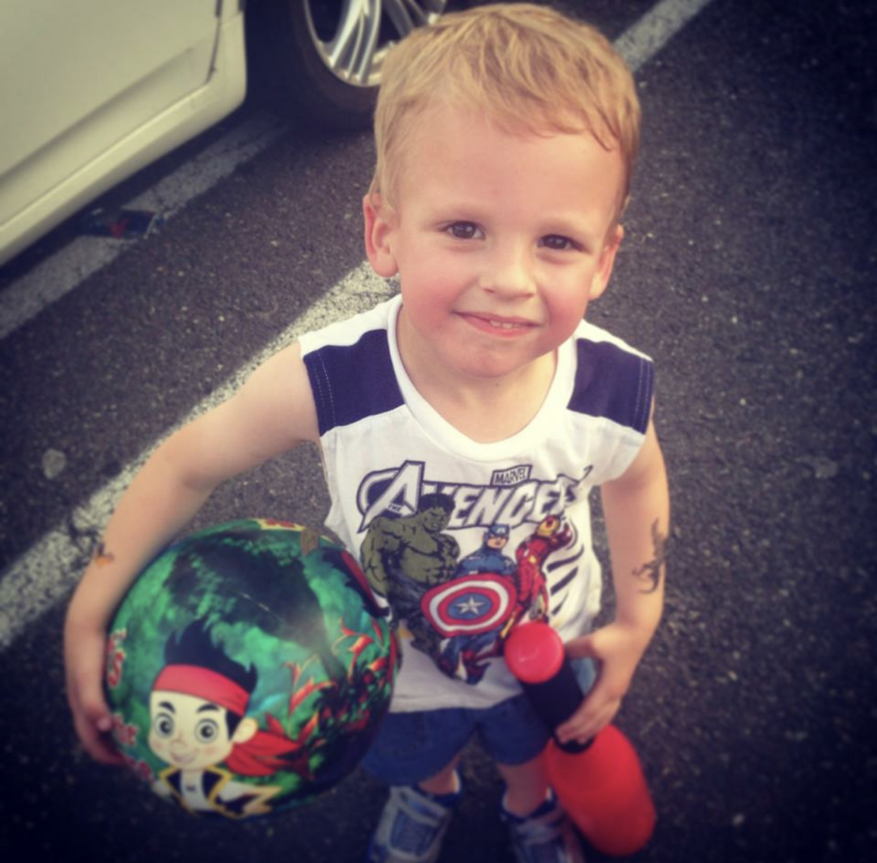 Sean ready for anything — Avengers shirt, ball in hand