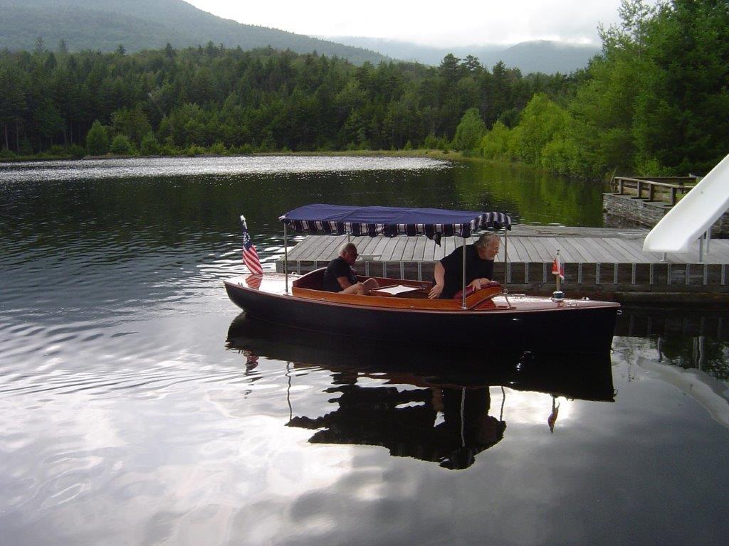 Richard's custom-built boat at the dock — cruising the lake with the guys, exactly his kind of afternoon