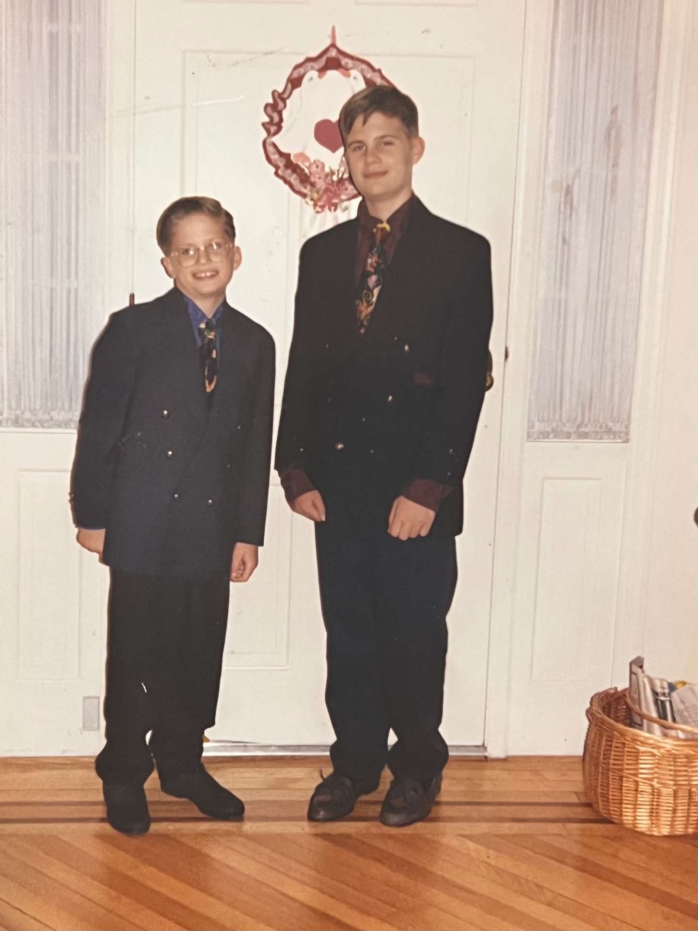The brothers in their sharp suits — Christopher and Jason ready for a family celebration